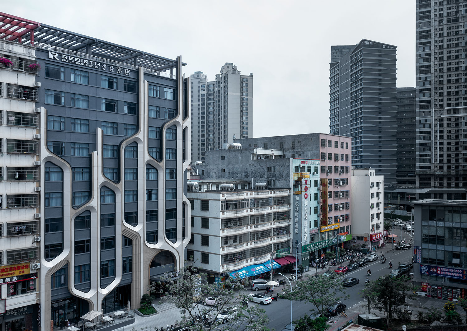 外立麵改造,建築外立麵改造,酒店外立麵改造,酒店外立麵設計,建築改造,海口德佳酒店立麵改造,海口,源合萬相建築設計